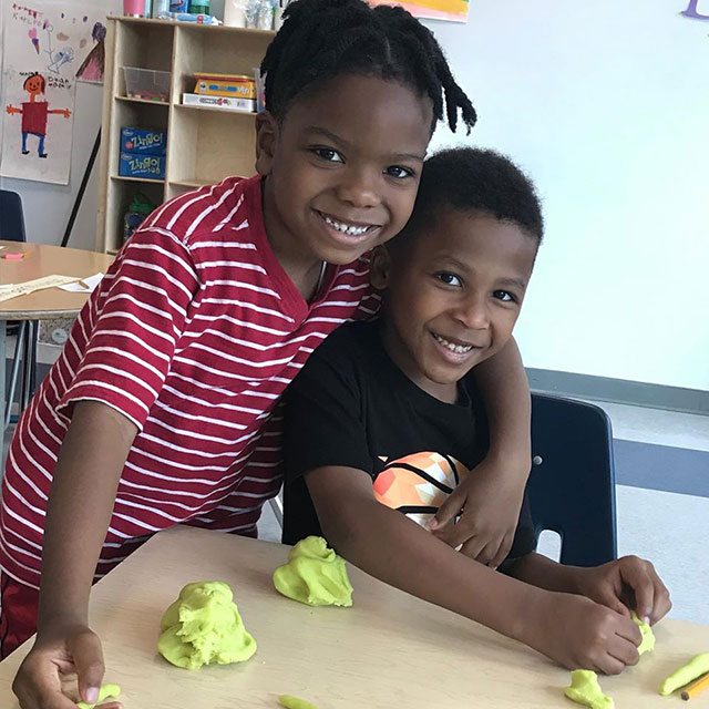 two smiling students